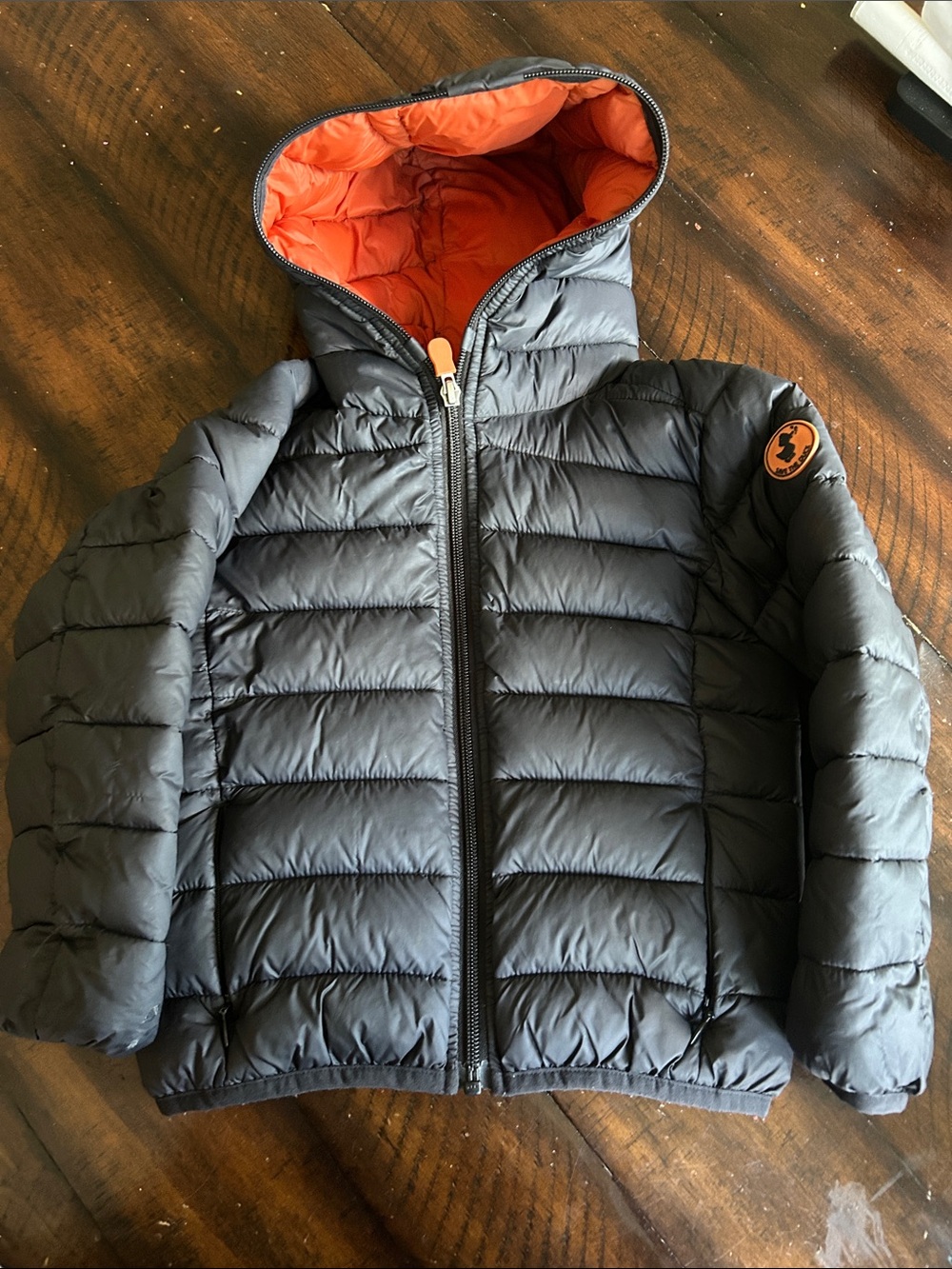 SAVE THE DUCK Kids Hooded Puffer Jacket in Black with Orange Lining